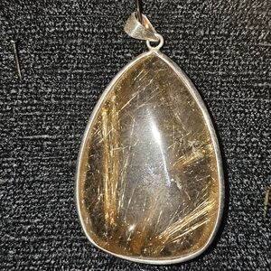 Elegant Gold and Silver Pendant